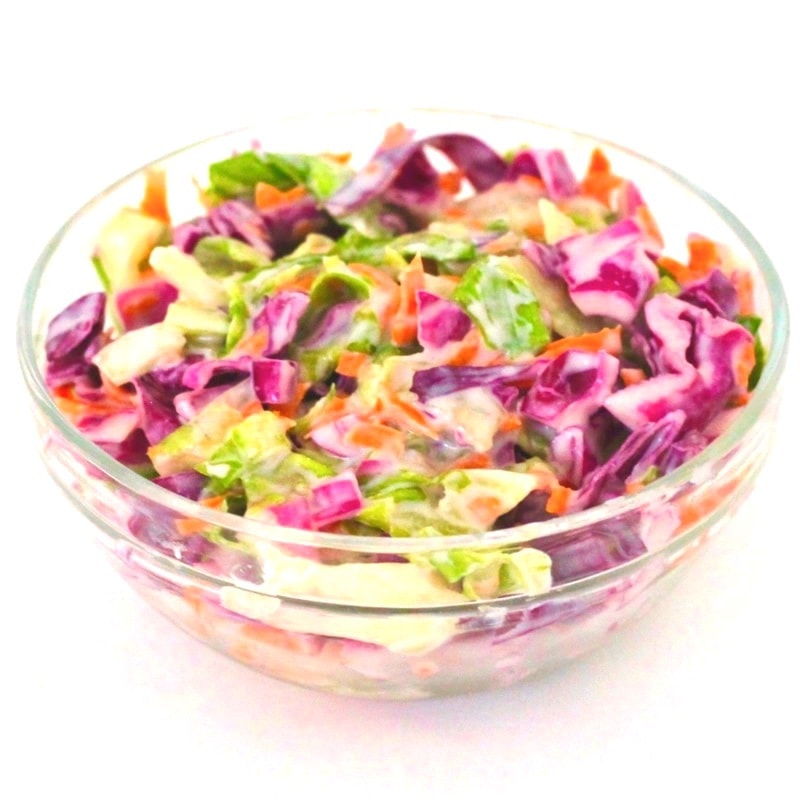 This AMAZING Vegan Coleslaw is absolutely delicious and tastes just like the real thing! Perfect for your vegan barbecue feast. It's also low-carb, dairy-free, gluten-free, oil-free, and sugar-free.