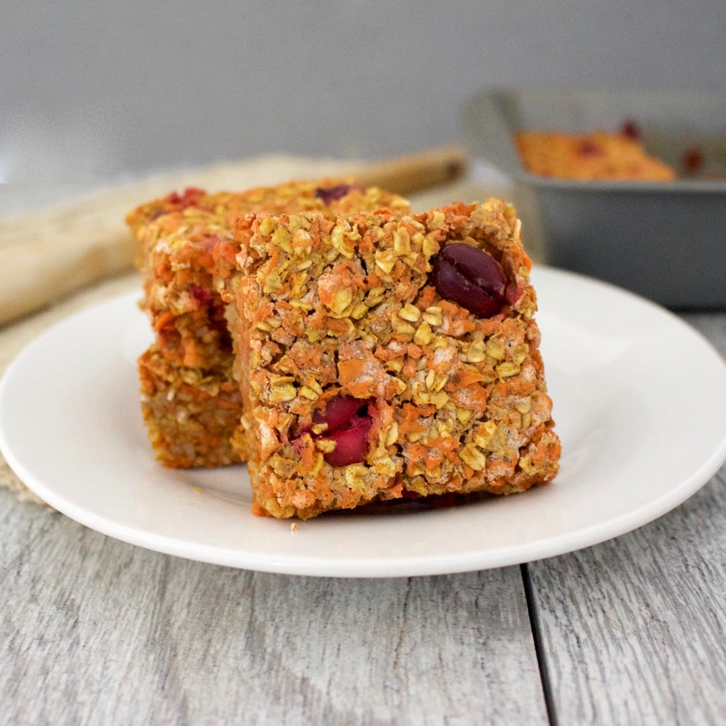 These AMAZING Cranberry Morning Glory Bars are loaded with sweet cinnamon flavor and are super delicious & healthy for you! They are vegan, gluten-free, sugar-free, low-fat, oil-free, and low-calorie - only 79 calories each!