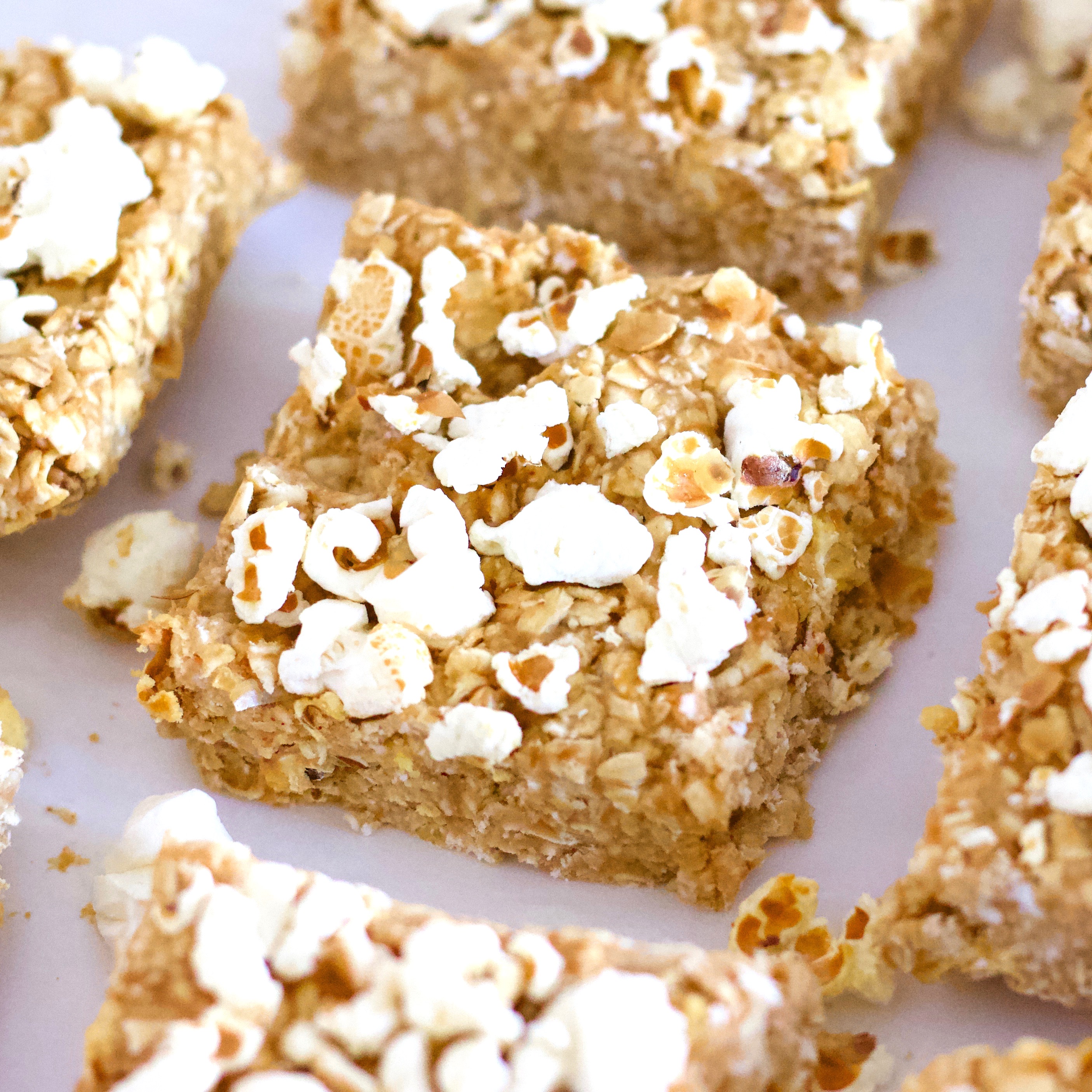 These No-Bake Peanut Butter Popcorn bars are totally delicious! They're super healthy and the perfect kid-friendly snack or treat. They are vegan, gluten-free, low-fat, dairy-free and sugar-free.